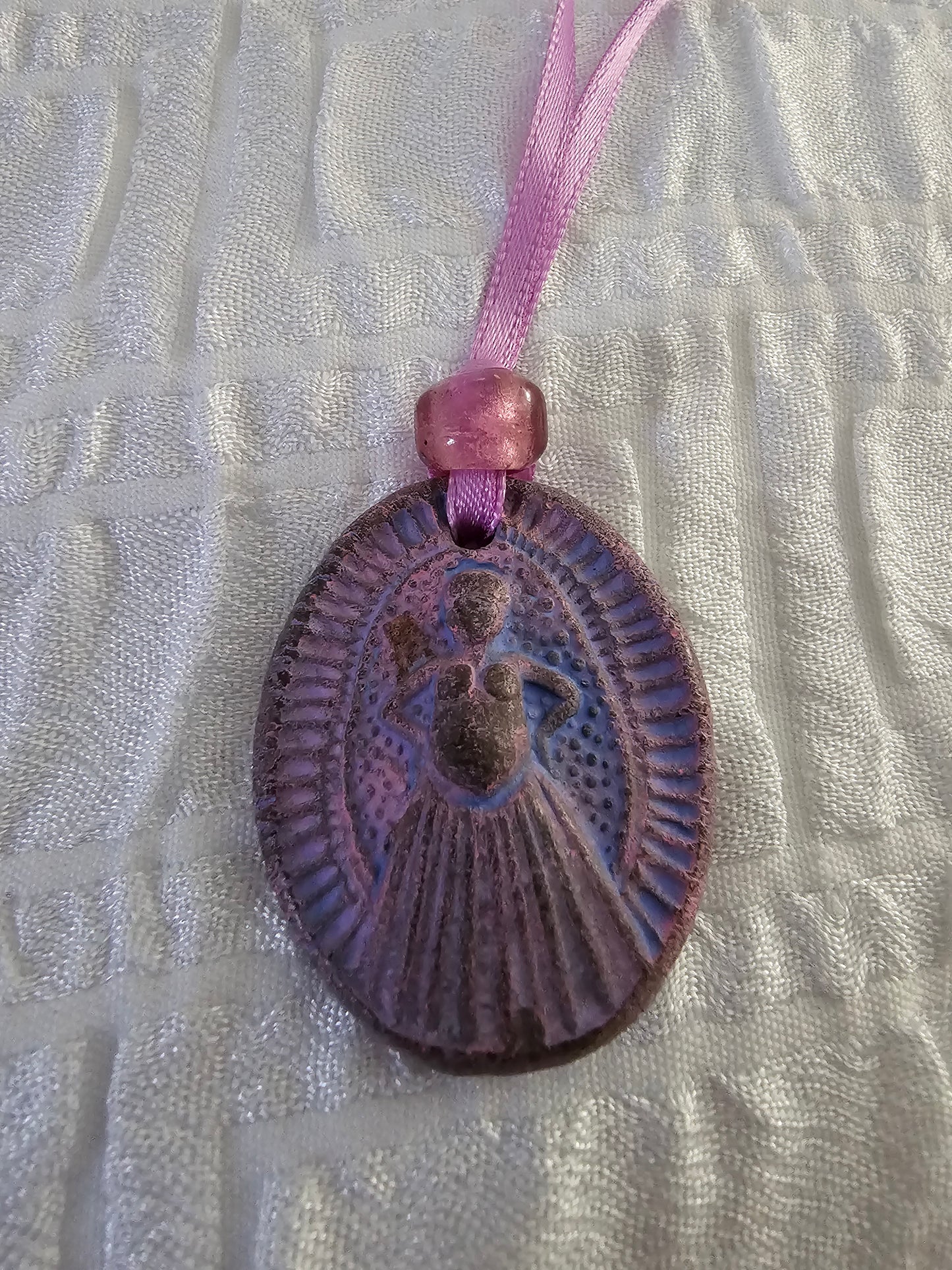 Mysterious Midwifery Medallions